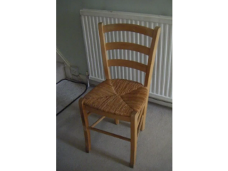 Wooden chair with cane seating. Very good condition.